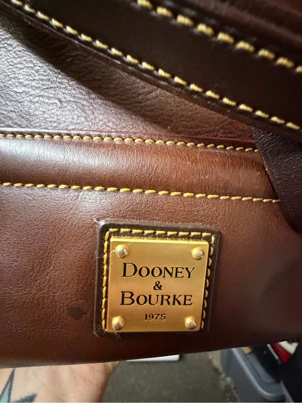 Dooney & Bourke Buckley Bag Leather Tote with Dual Handles in the color Chestnut